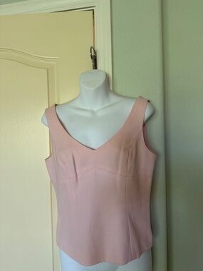 BCBG MaxAzria  structured top with side zipper.